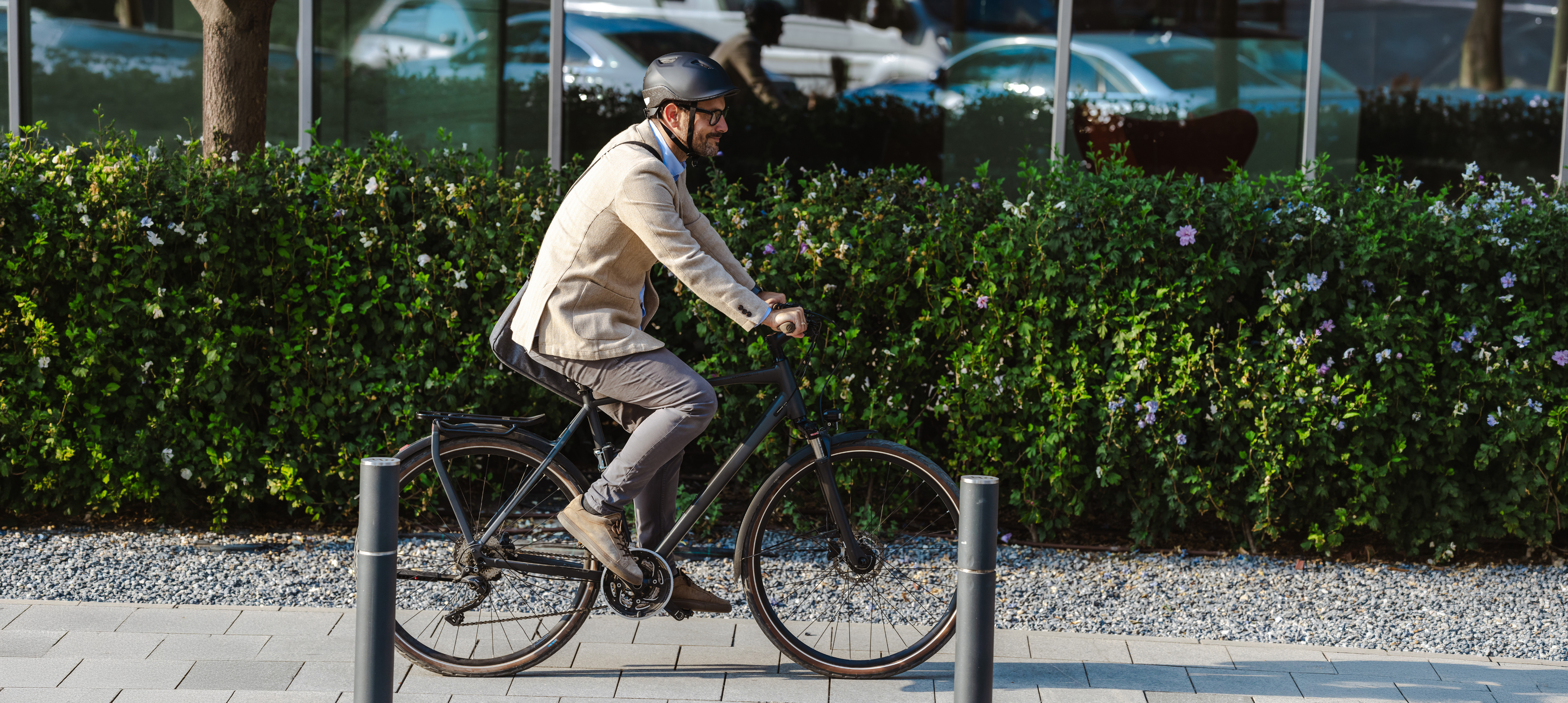 Cyclist commuting along sustainable development
